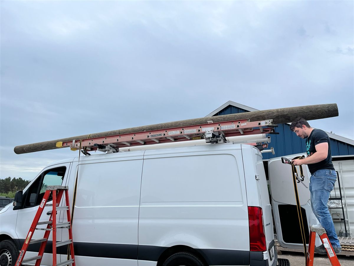 Electrician loading the service van for a GTA call